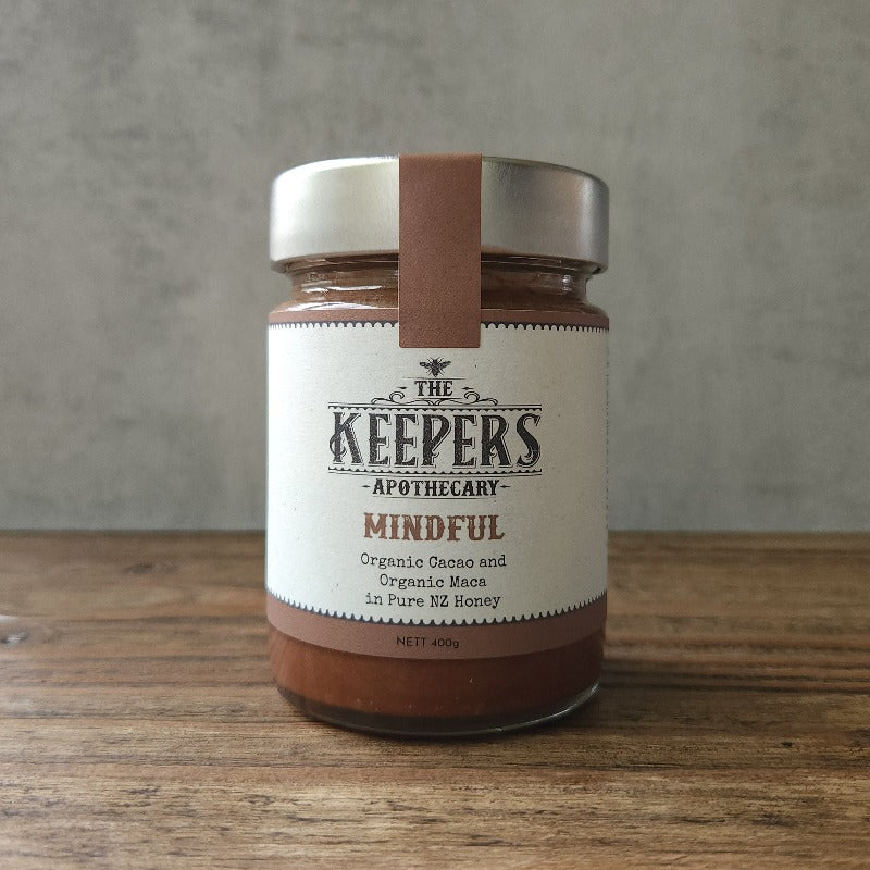 A jar of Mindul, a Keepers Apothecary honey blend with organic cacao and organic maca in pure NZ honey
