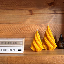 Load image into Gallery viewer, Pointed beeswax candles on shelf
